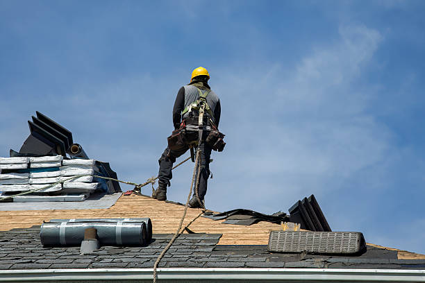 Professional Storm Damage Roof Repair technician working in White Hall, MD